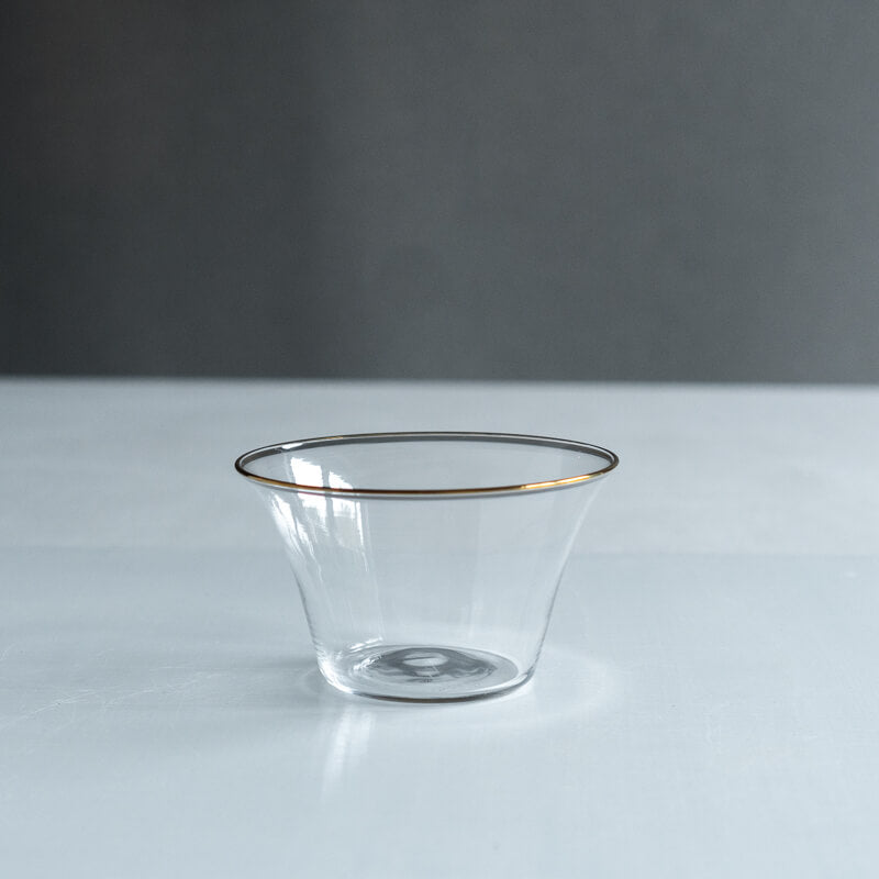 Clear glass bowl (OKUTAKE hoop soribachi SS) with a thin hoop rim photographed on a neutral surface.