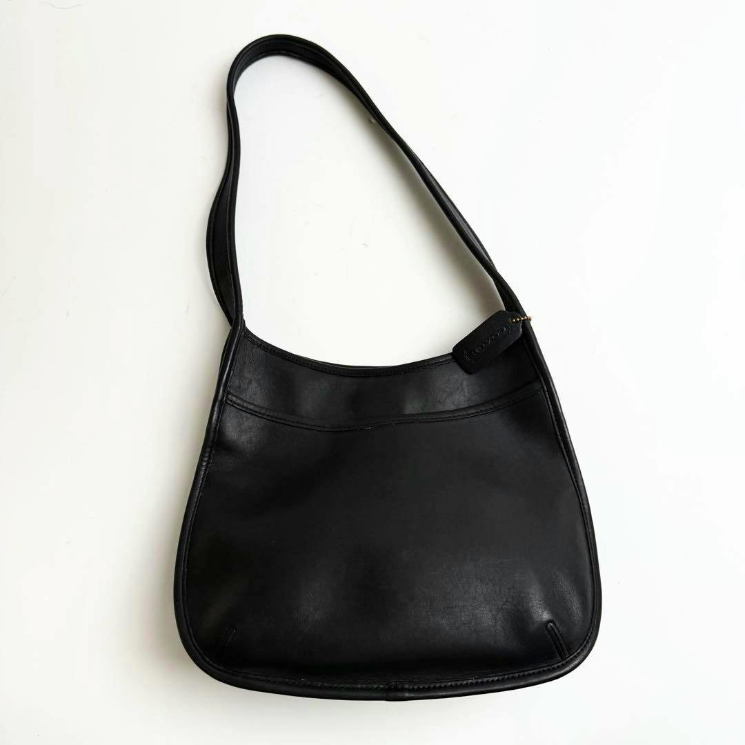 OLD Coach Ergo leather shoulder bag in black shown flat on a white background.