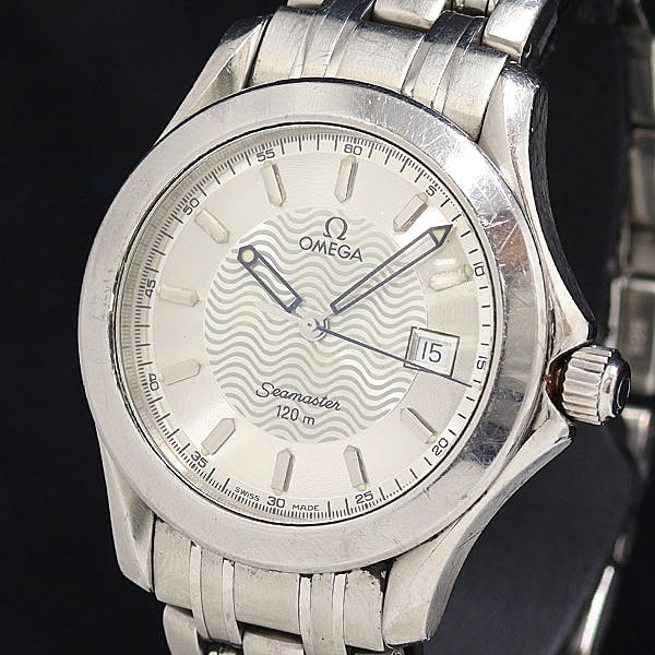 Front view of the Omega Seamaster 120m quartz men's wristwatch with a silver wave-pattern dial, date at 3 o'clock, and stainless steel bracelet.