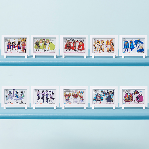 Ten ONE PIECE ANIMATION WORKS Elbaf-edition character frame magnets displayed on two horizontal shelves against a pale blue background.