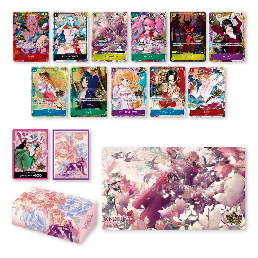Mockup image showing multiple ONE PIECE trading cards, card sleeves, a themed deck box, and a playmat.