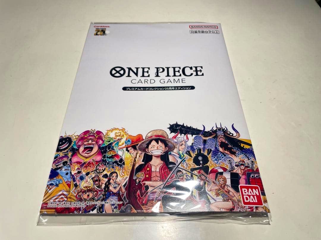 Sealed ONE PIECE Card Game Premium Card Collection 25th anniversary box with character artwork and logo on the front.