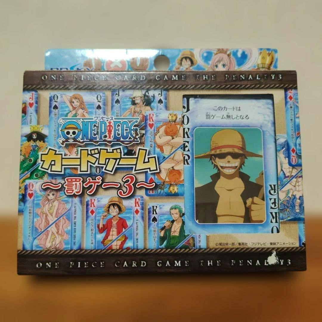Front of boxed One Piece trump deck showing card artwork and a Joker card illustration.
