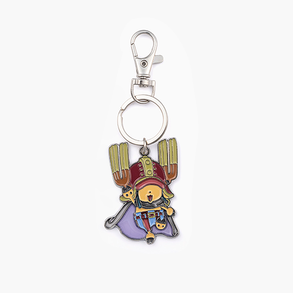Photograph of the zinc alloy One Piece ELBAPH stained-glass style Chopper metal keychain on a white background.