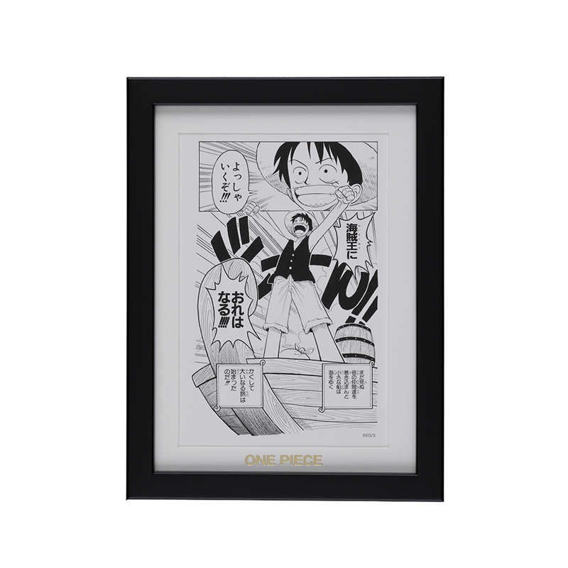 Framed 'ONE PIECE' manga art print showing Luffy standing on a barrel with Japanese speech bubbles, displayed in a black frame labeled 'ONE PIECE' at the bottom.