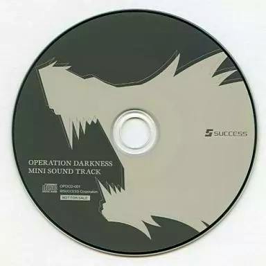 Photograph of the CD labeled "OPERATION DARKNESS MINI SOUND TRACK" with stylized artwork and the Success logo.