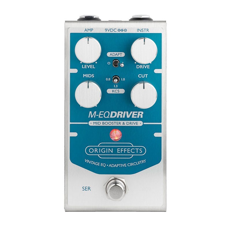 Top-down photo of an Origin Effects M-EQ DRIVER guitar effects pedal showing four control knobs, a footswitch, and a blue-and-silver case.