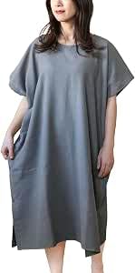 Woman wearing a gray wearable towel-style bathrobe shown from the front.