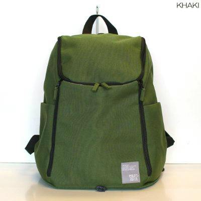 Front view of a green polyester pet carrier backpack on a white background.