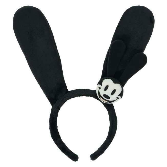 Black plush headband with two tall rabbit ears and an Oswald the Lucky Rabbit face decoration.
