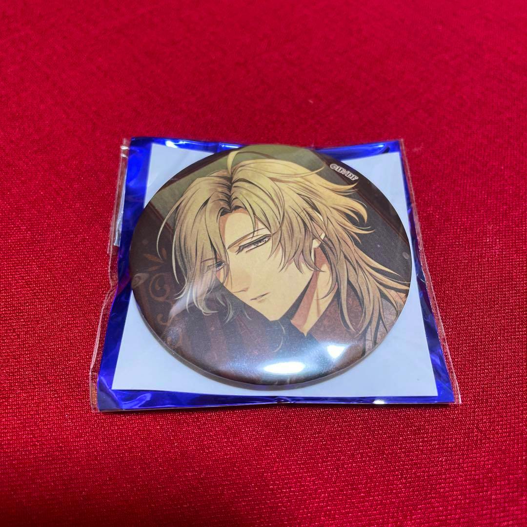 Sealed round can badge depicting the character Anri from Piofiore no Bansho, photographed on a red fabric background.
