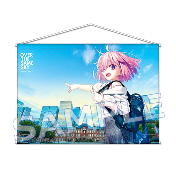 B2 tapestry mockup showing an illustrated pink-haired girl pointing toward a city skyline, displayed hung with a rod and string.