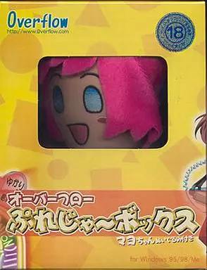 Front photo of the boxed Overflow Windows95/98/Me CD software 'ぷれじゃ〜ぼっくす' showing the box front with a pink-haired plush visible through a window.