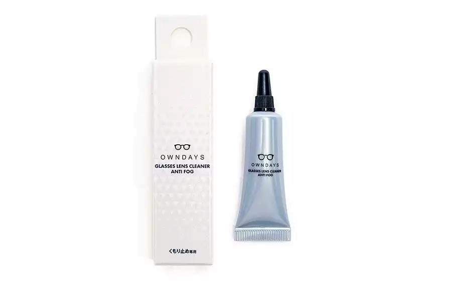 A silver tube of OWNDAYS anti-fog glasses lens gel displayed beside its white packaging box on a white background.