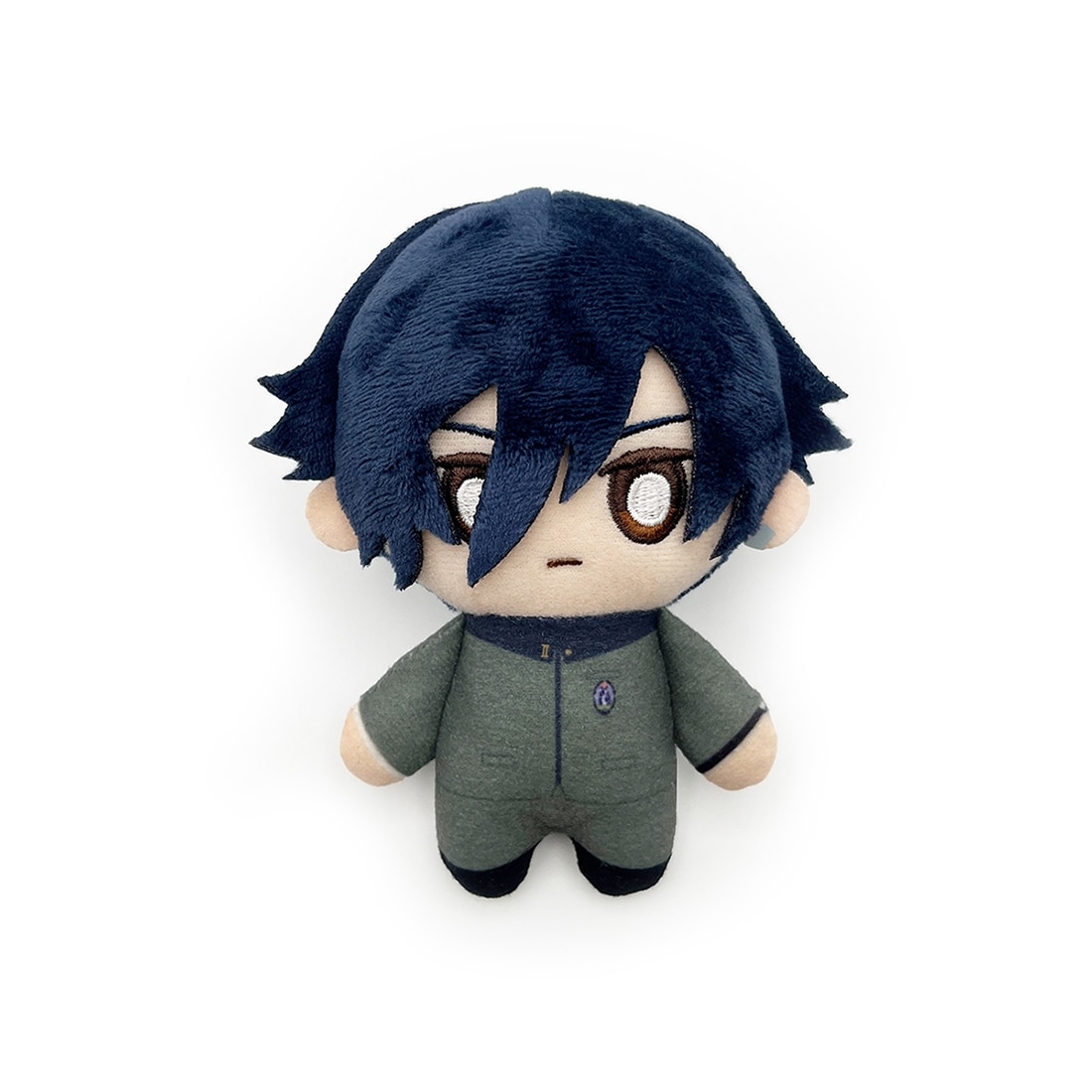 Front view of the protagonist plush keychain showing the doll with dark blue hair and a green outfit.