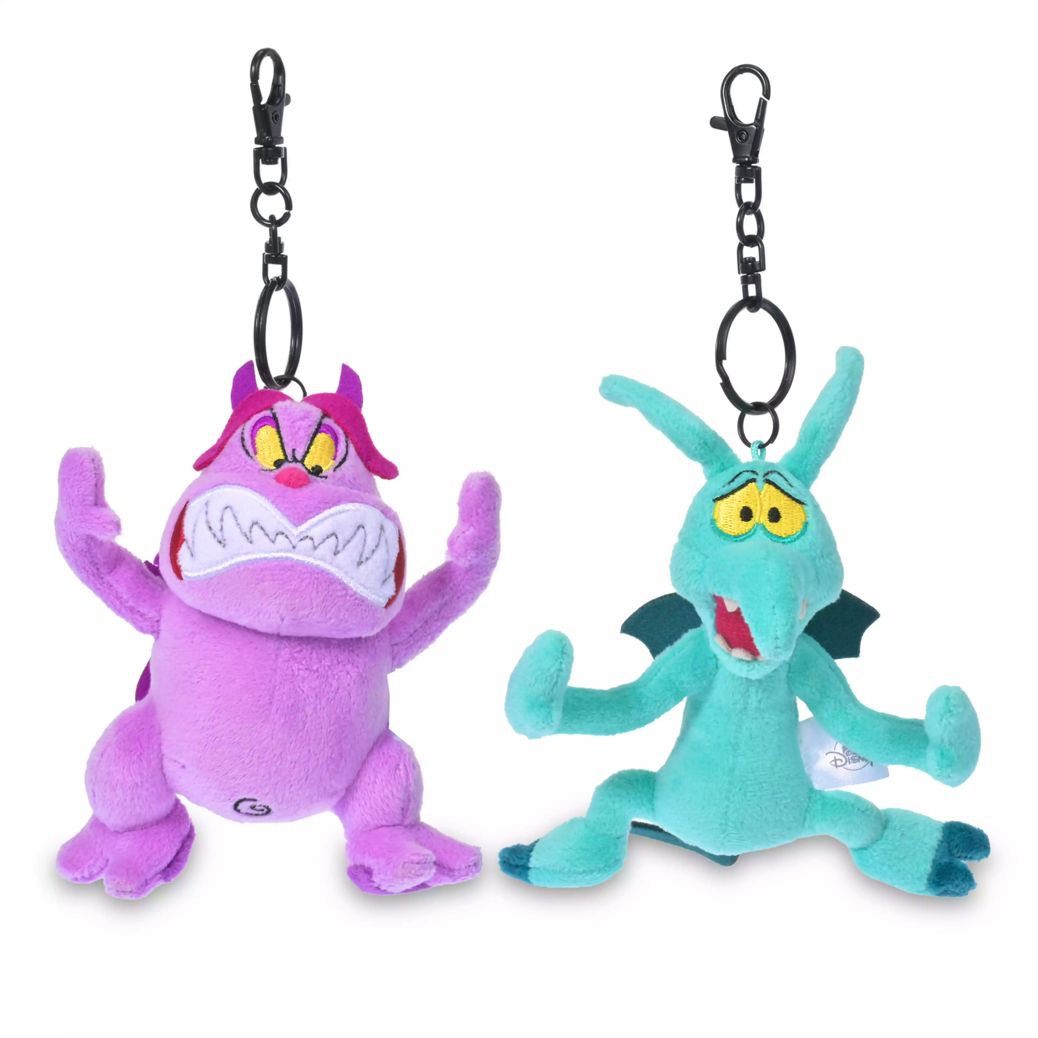 Two plush keychain toys (one pink, one teal) shown hanging from black metal keychain clips on a white background.