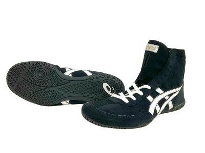 Pair of black high-top textile shoes with white stripes and laces, one shoe showing the sole.
