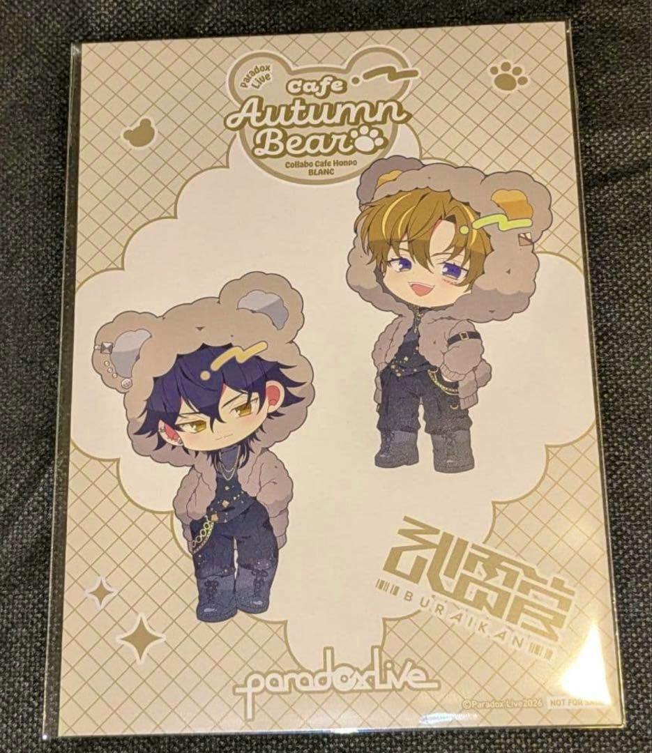 Photocard (2L) showing two chibi illustrations of the character 武雷管 in bear-hooded outfits with 'cafe Autumn Bear' and paradox live logos.