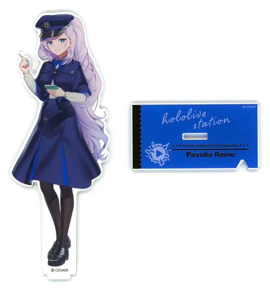 Acrylic stand of Pavolia Reine character shown alongside a separate blue rectangular display base labeled "hololive station".