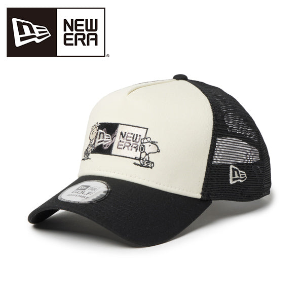 Front three-quarter photo of a chrome-white and black New Era PEANUTS trucker cap with embroidered logo on the front panel.