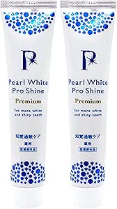 Two Pearl White Pro Shine toothpaste tubes (set of 2) with blue decorative dots on white packaging.