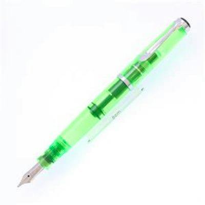 Translucent shiny green Pelikan M205 DUO fountain pen shown uncapped displaying its nib.