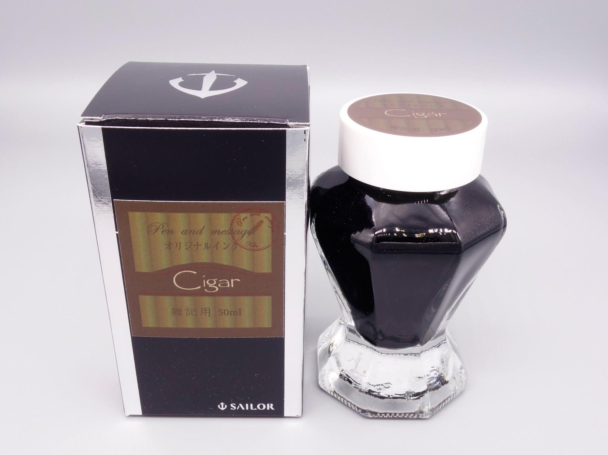 A fountain pen ink bottle labeled "Cigar" displayed next to its product box.