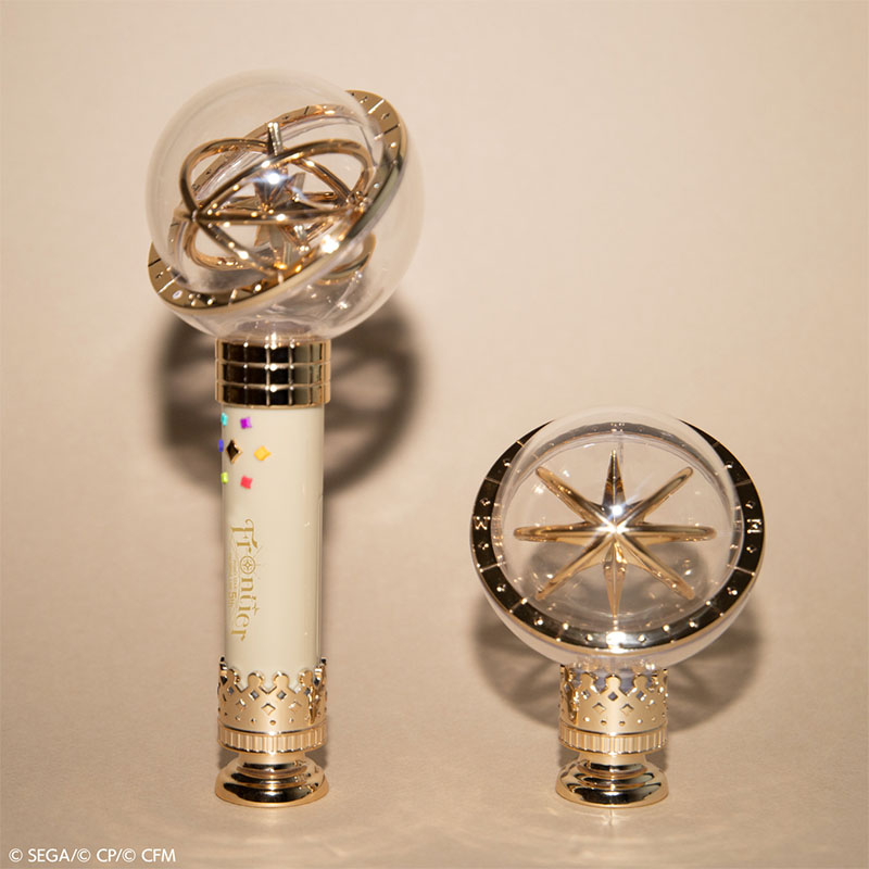 Photograph of two handheld penlight lights, one standing upright and one showing the top piece, on a neutral background.