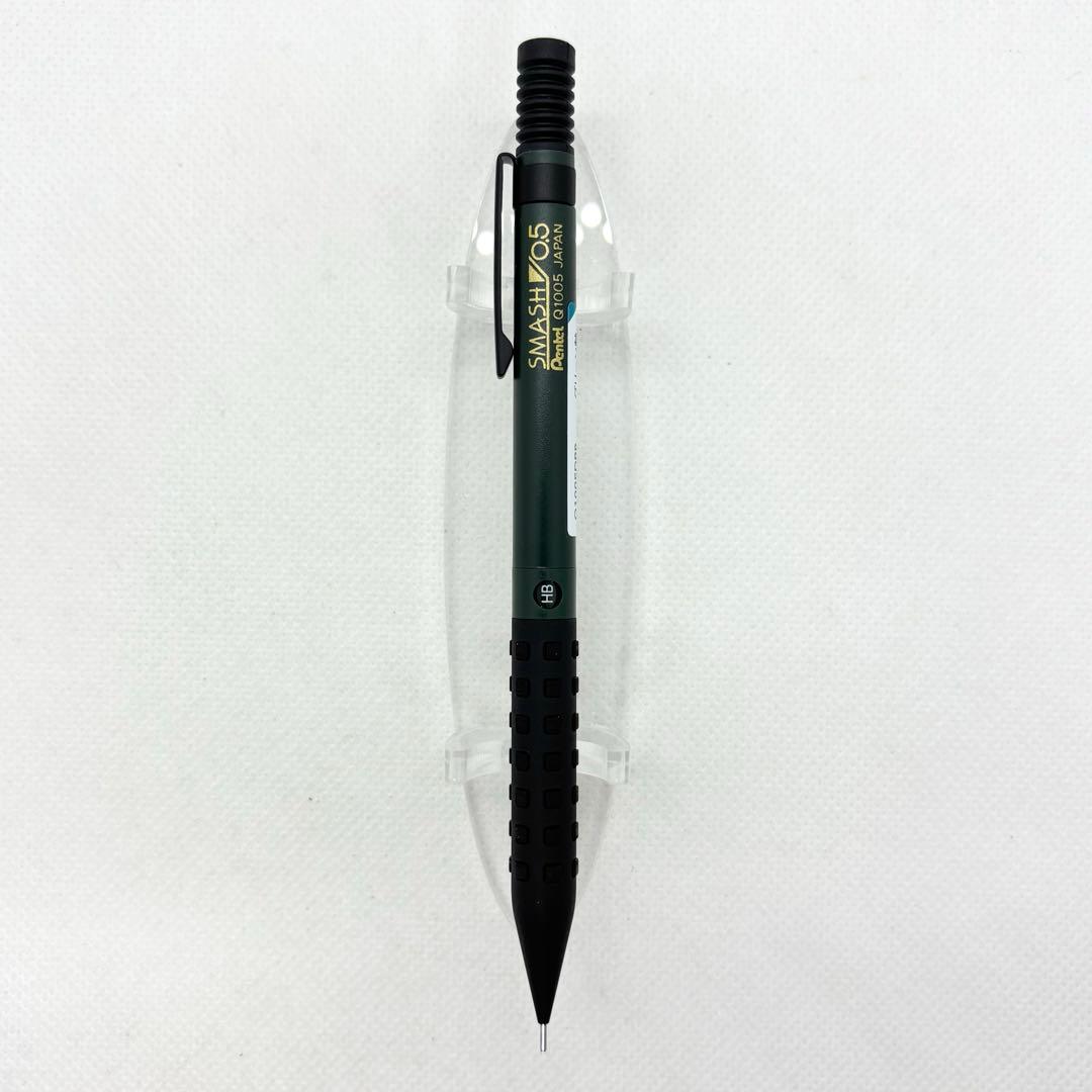 A green SMASH 0.5mm mechanical pencil shown vertically on a white background.