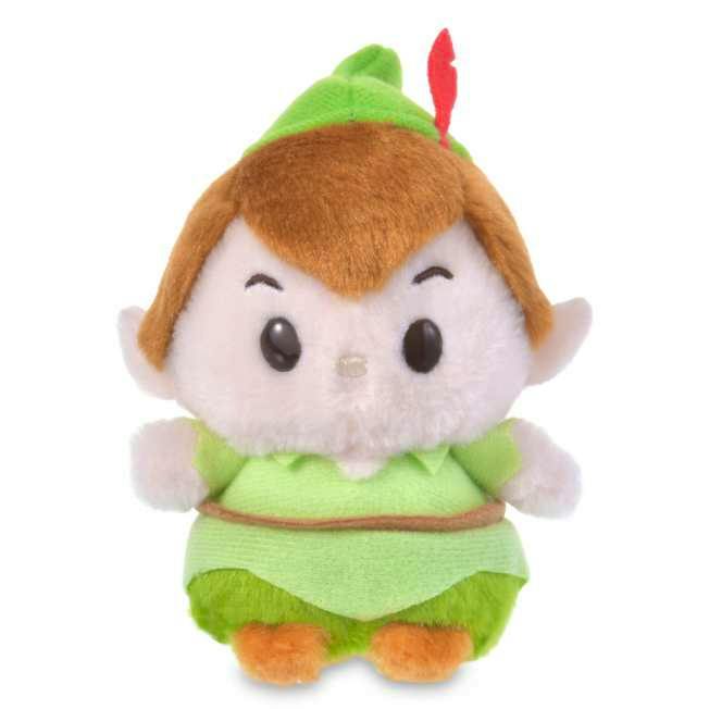 Front view of a Peter Pan plush toy wearing a green outfit and a green hat with a red feather.