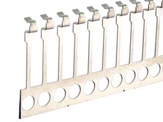 Metal lead-frame for a PCB showing multiple bent terminals mounted on a perforated carrier strip.
