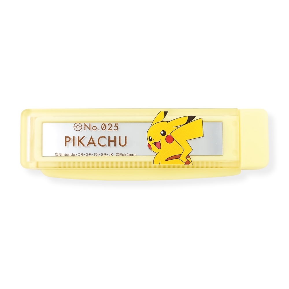 Yellow plastic hair comb with a built-in mirror showing a Pikachu design.