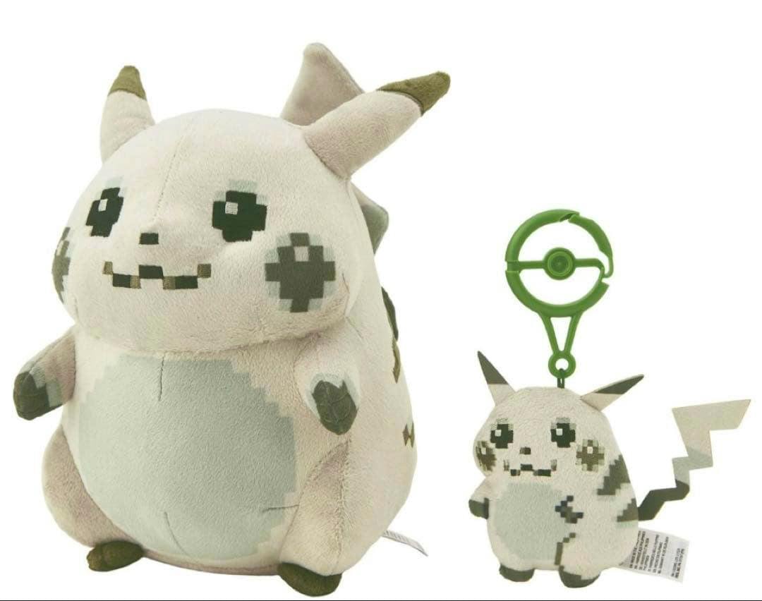 Two はじまりのピカチュウ plush mascots (a larger plush and a smaller keychain) shown on a white background.