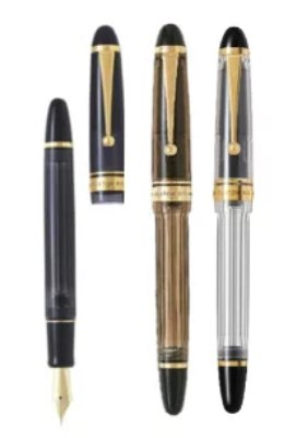 Group view of Pilot Custom 823 fountain pens showing caps, barrels, and one uncapped nib.