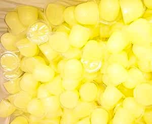 Close-up photo showing many small yellow beetle jelly cups filling the frame.