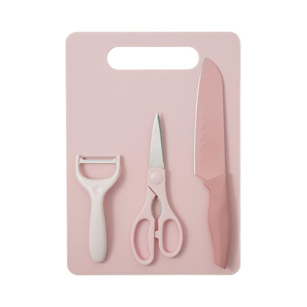 Pink 4-piece cutting set showing a cutting board with a peeler, kitchen scissors, and a chef knife arranged on it.