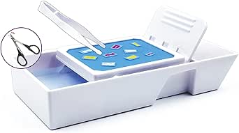White plastic water-transfer decal quick tray with an inset soaking plate, decal pieces, and depicted resin tweezers and curved scissors.