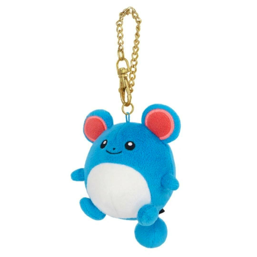 Blue Marill plush keychain with a white belly and gold chain clasp on a white background.