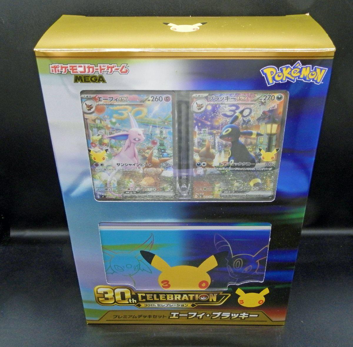 Front of boxed Pokémon Card Game 30th Celebration Premium Deck Set showing Espeon and Umbreon card artwork visible through the display window.