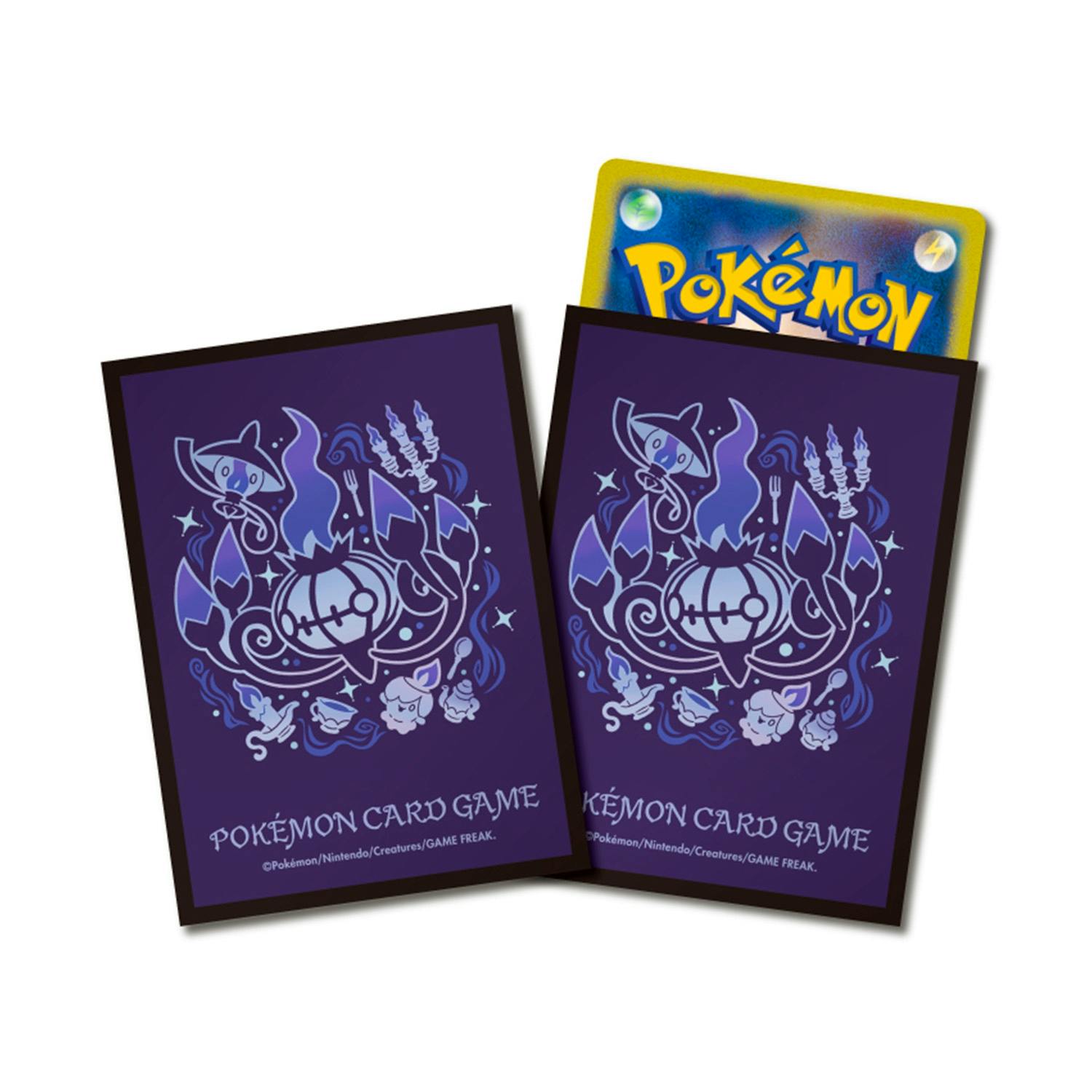 Two purple Pokémon deck sleeves with Chandelure-themed artwork, one with a partially inserted Pokémon card.