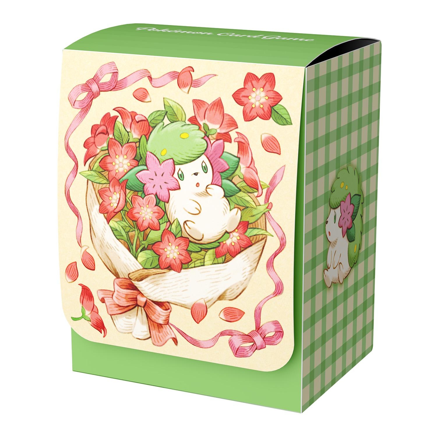A green and cream Pokémon deck case box showing Shaymin surrounded by pink flowers.