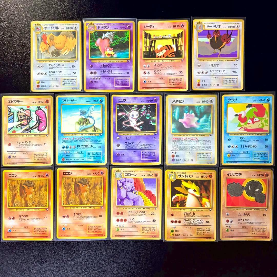 Fronts of sixteen vintage Japanese Pokémon trading cards arranged in a grid, showing artwork including Mew.