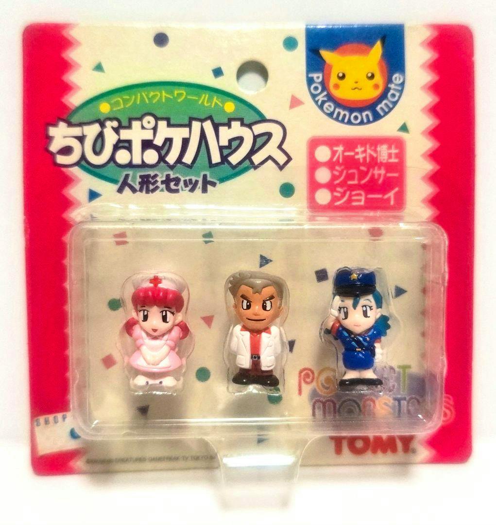 Front blister package showing three small Pocket Monsters character figures in a plastic blister with Japanese packaging and the TOMY logo.