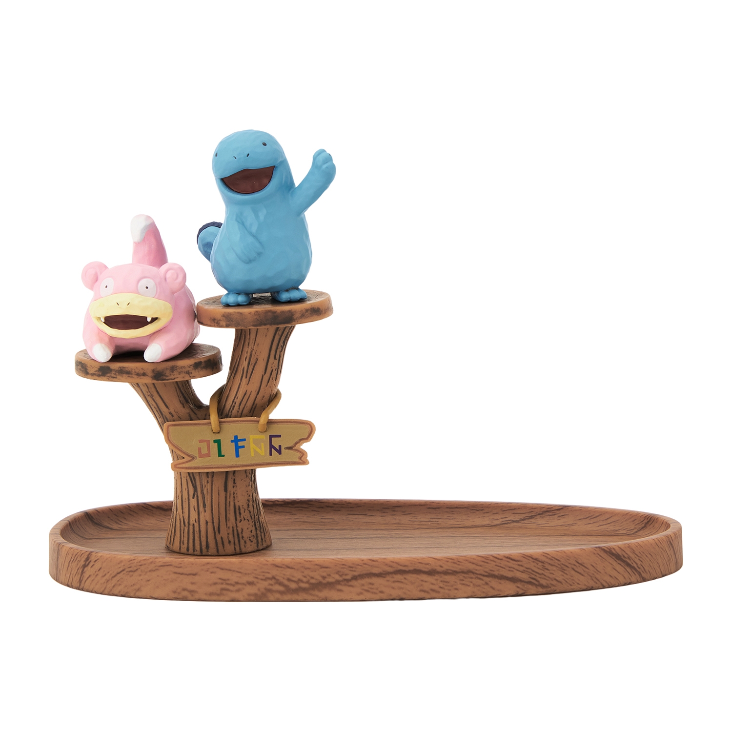 Wood-effect small tray with a tree-shaped stand displaying Slowpoke and Quagsire figurines.