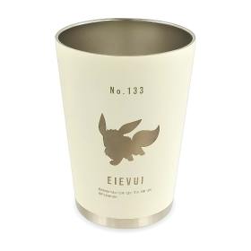 Stainless steel tumbler with a cream exterior showing an Eevee silhouette and printed text.