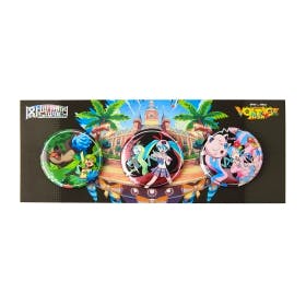 Four round can badges featuring colorful anime-style characters displayed on a black backing card.