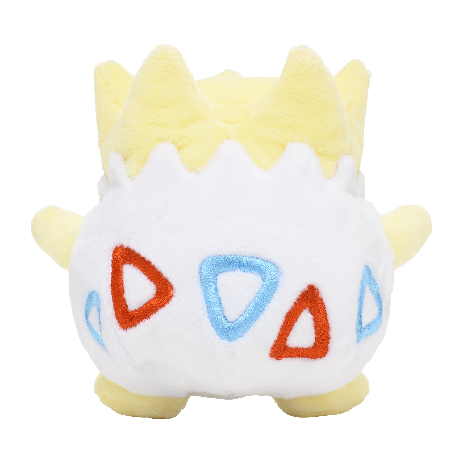 Rear view of a Togepi plush showing the white shell with blue and red triangle patterns and a yellow top and limbs.