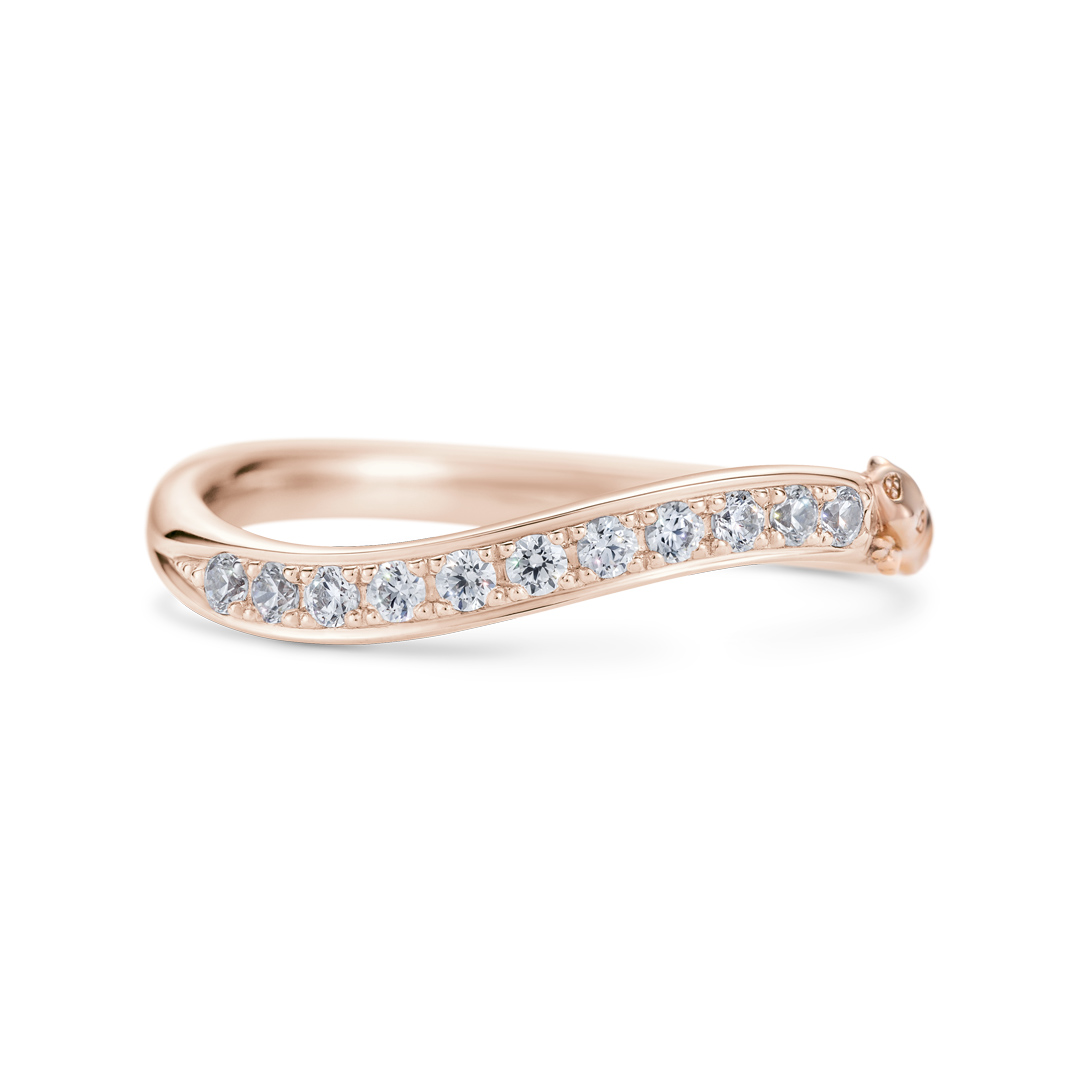 K18 pink gold half-eternity ring with a curved row of small diamonds shown on a white background.