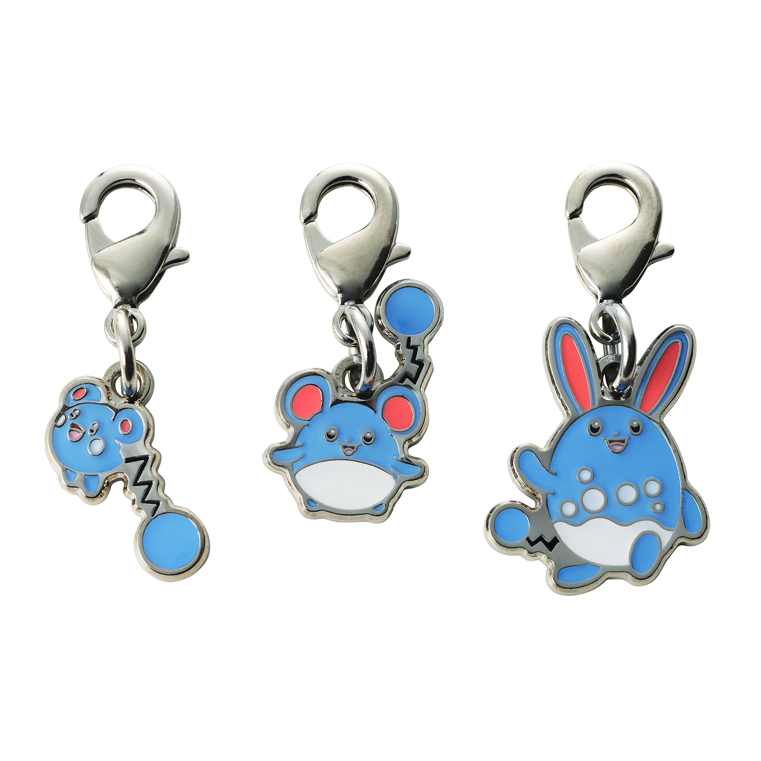 Three blue metal keychain charms with lobster-clasp attachments showing small character designs.
