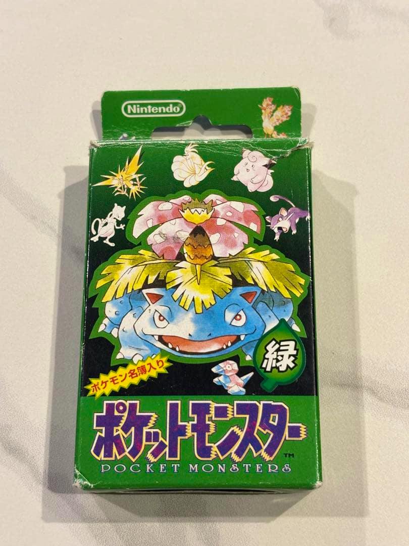 Front of a green Pokémon playing card (trump) box showing Venusaur artwork and the Nintendo logo.